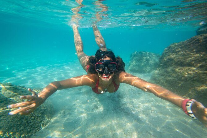 Half Day Private Cruise Tour with Snorkeling and Fishing in Kona - The snorkeling experience: coral, turtles, and the reality of a floating reef