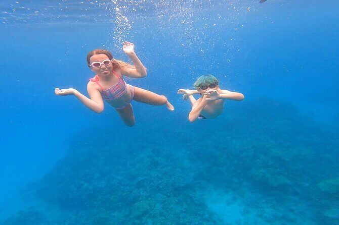 Half Day Private Cruise Tour with Snorkeling and Fishing in Kona - Captain Cook Monument and Makalawena: how your snorkel location gets picked